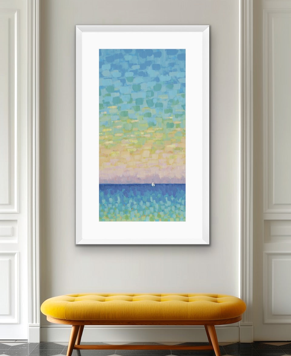 A framed abstract landscape art print featuring a blue and green textured sky over a blue sea with a small sailboat, displayed on a light gray wall above a yellow tufted bench.