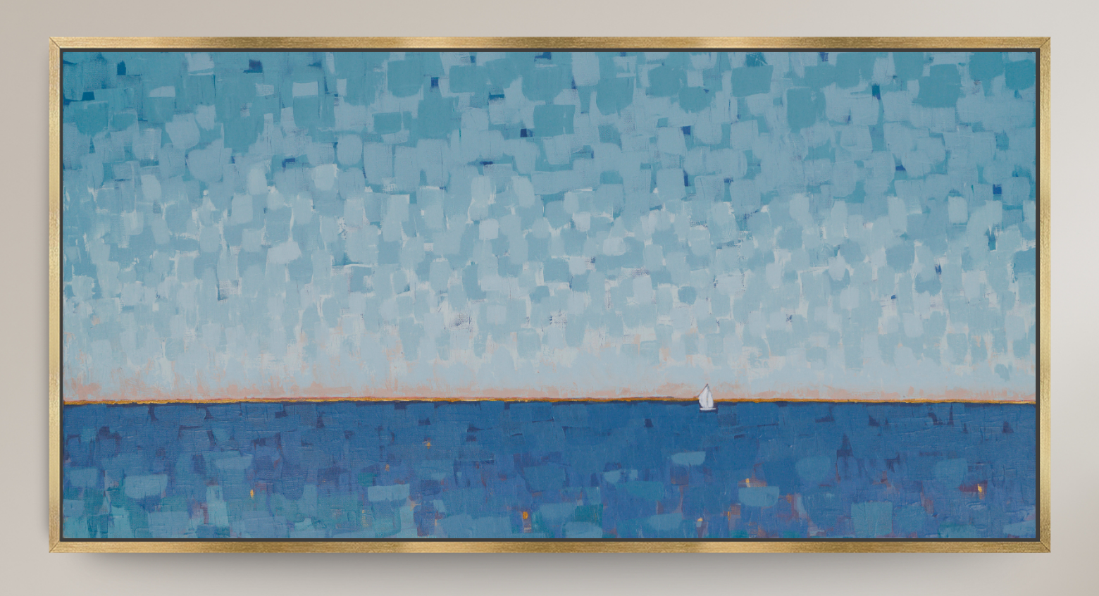 A framed abstract landscape painting featuring textured blue and light blue blocks, with a thin warm line separating the sky and sea, and a small white sailboat near the horizon. The artwork is housed in a thin gold frame and displayed against a neutral beige wall.