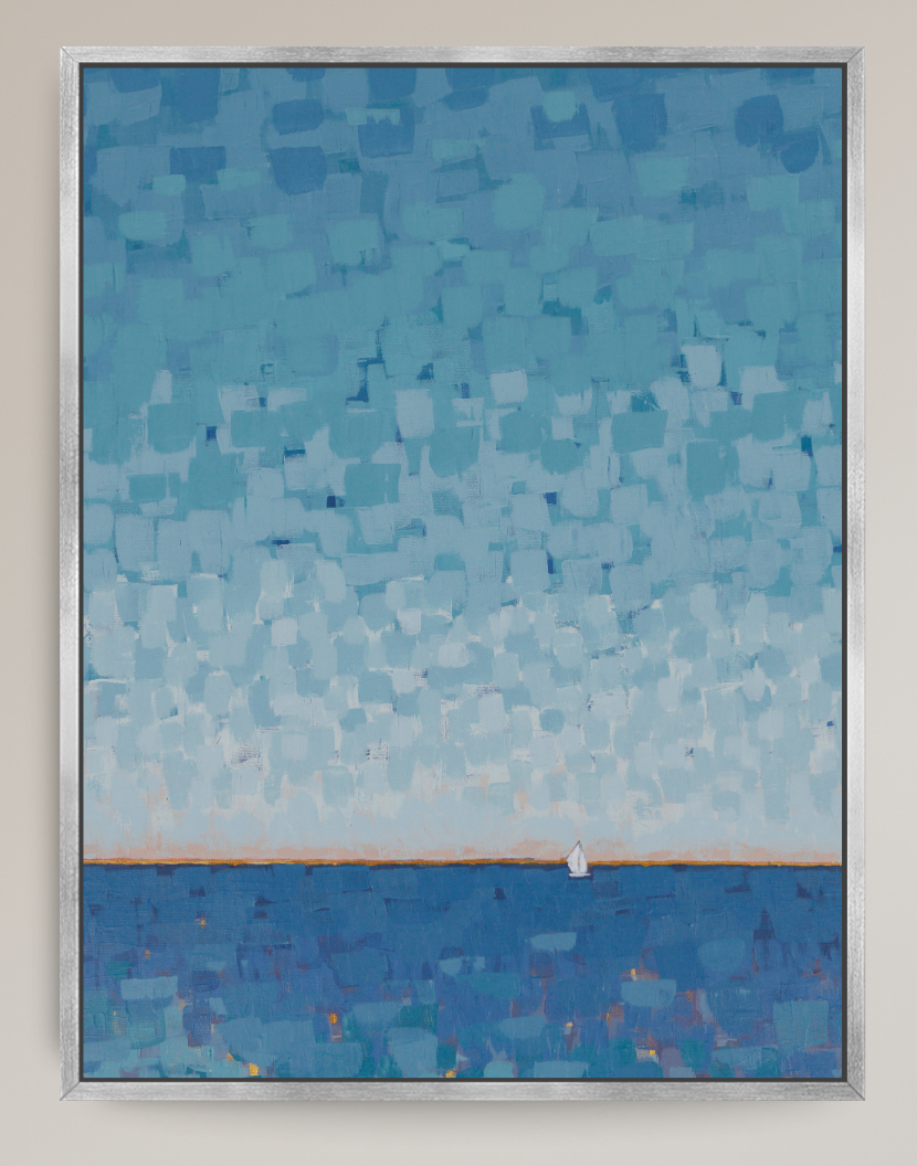 A framed abstract landscape painting featuring a textured blue sky and sea with a tiny white sailboat near the horizon, presented in a silver frame against a neutral beige wall.