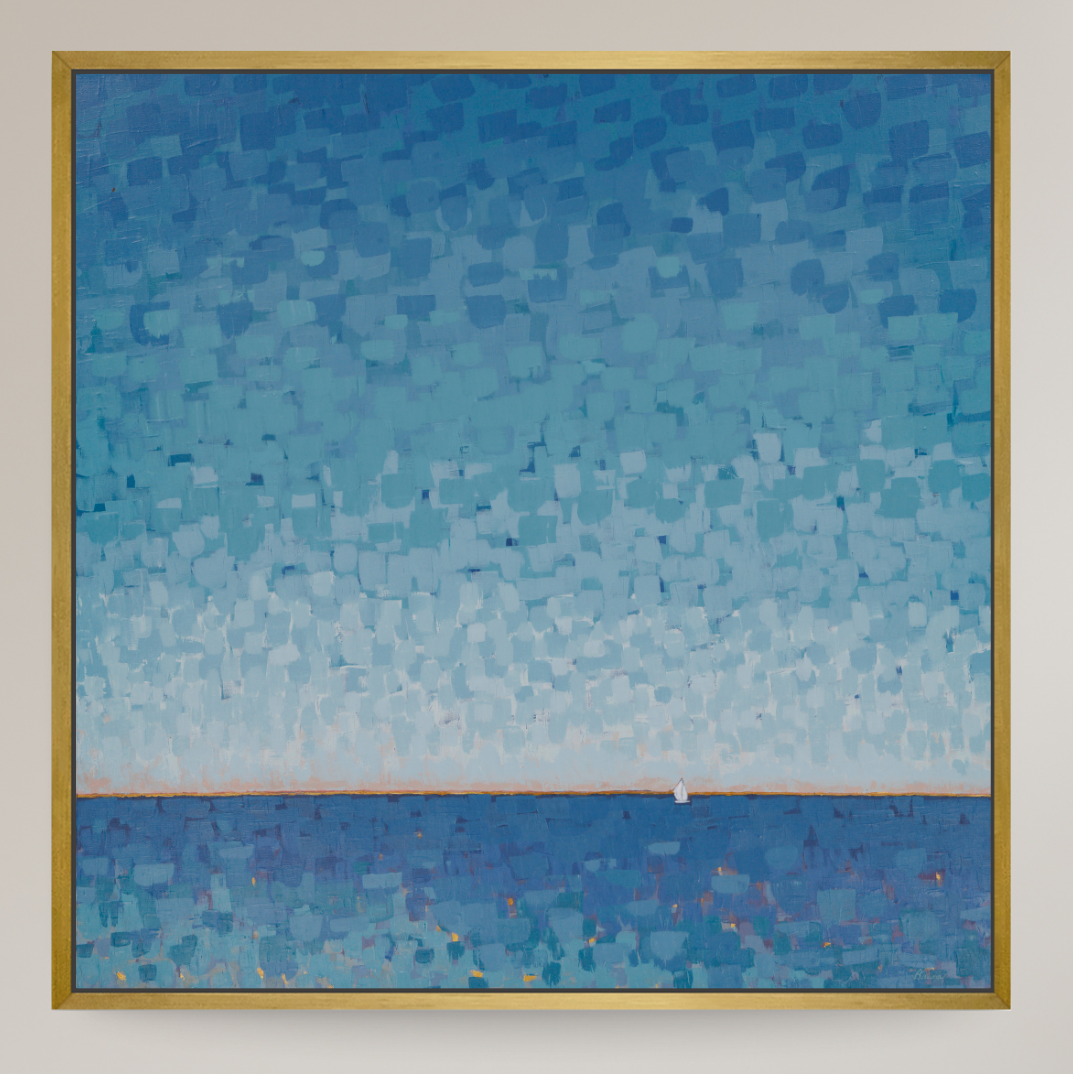 An abstract landscape painting of a sea under a blue sky, featuring textured blocks of blue and light blue tones, with a small white sailboat on the horizon. The painting is housed in a square gold frame and mounted on a light beige wall.