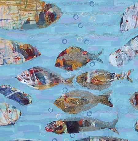 Collage of fish shapes on a blue background with bubbles