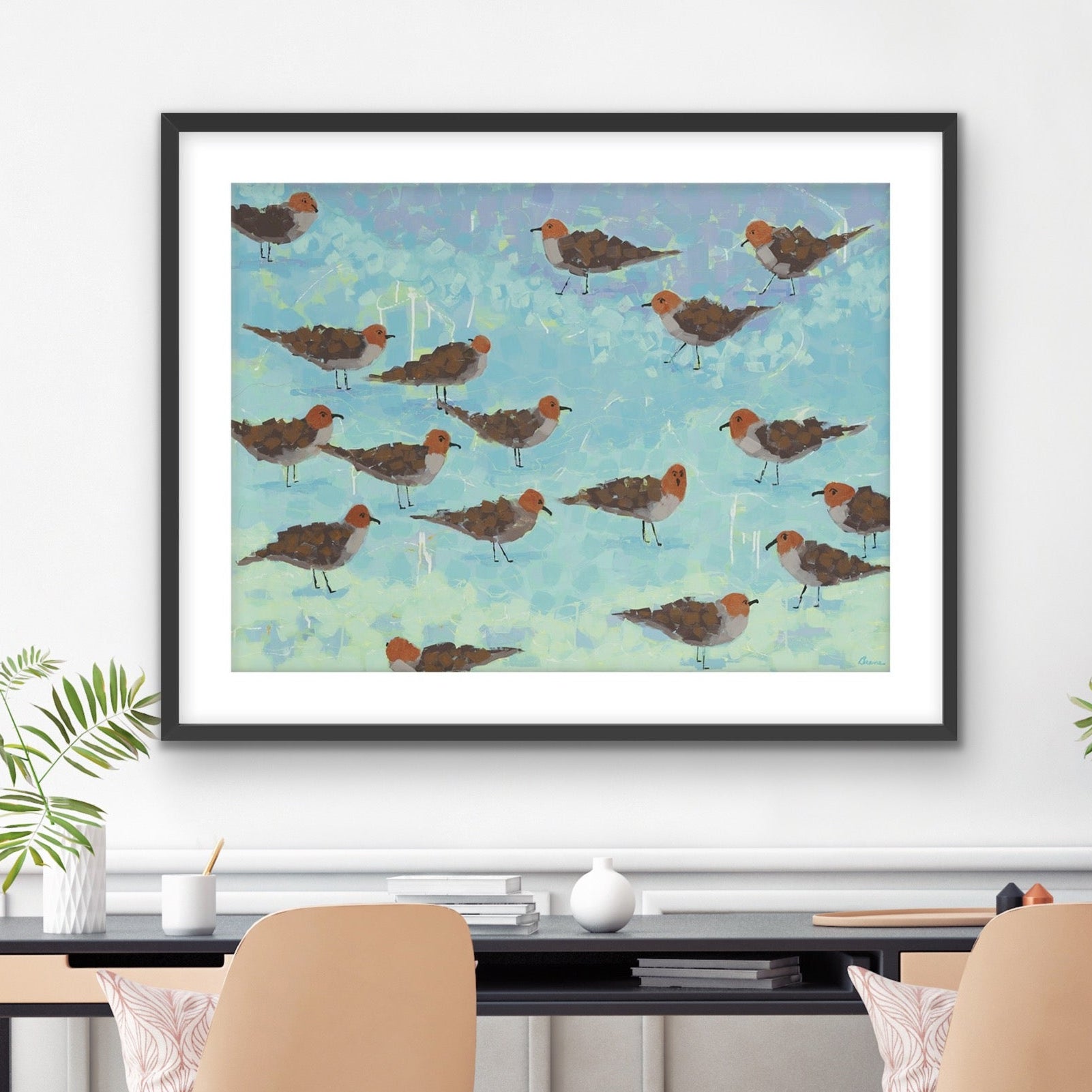 Coastal chic decor of comical seagulls on the beach in a modern interior setting.