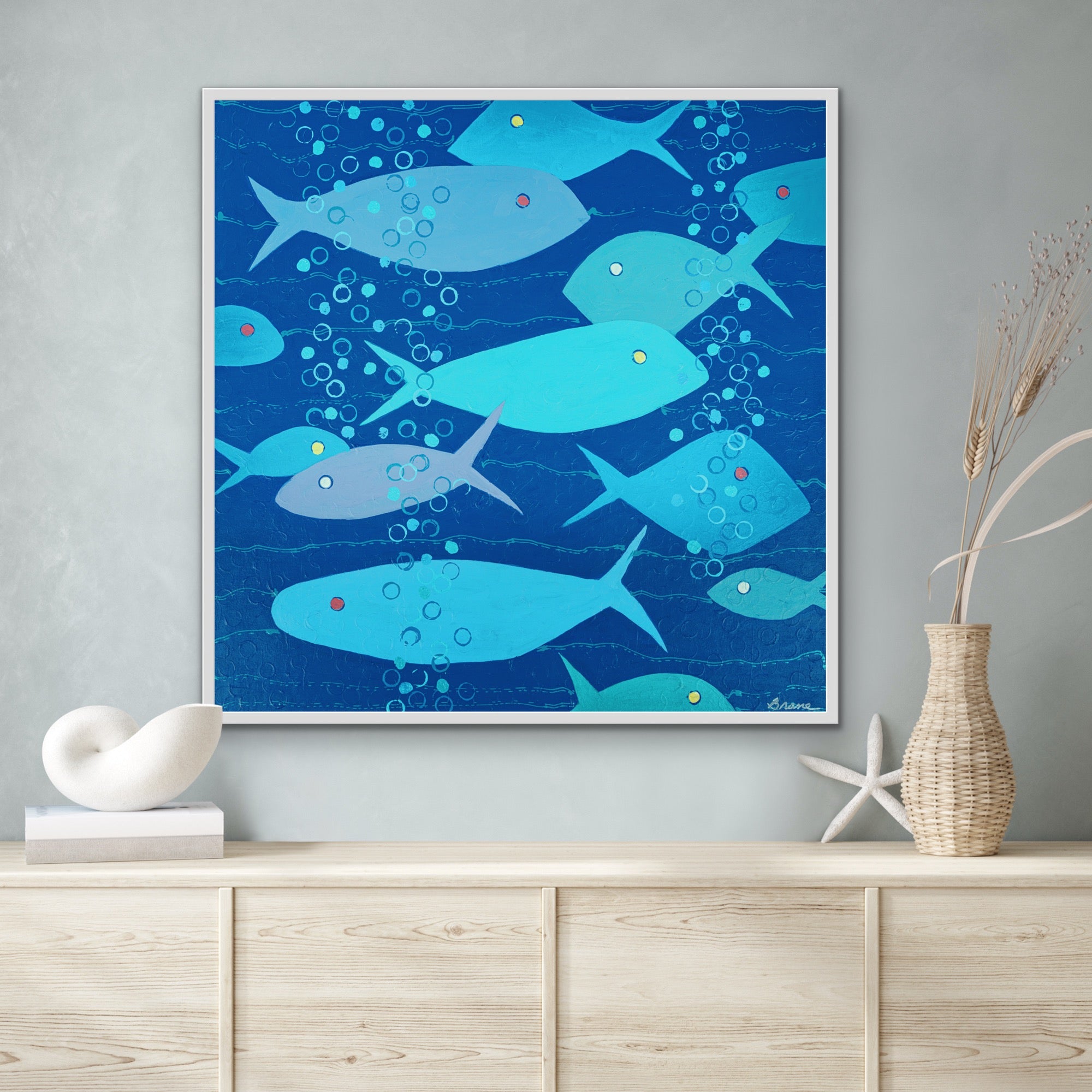 archival giclée canvas by contemporary coastal artist Martha Brane. Vivid ocean blues, playful bubbles, and symbolic fish imagery evoke tranquility and connection. Luxury coastal wall art, ready to hang.