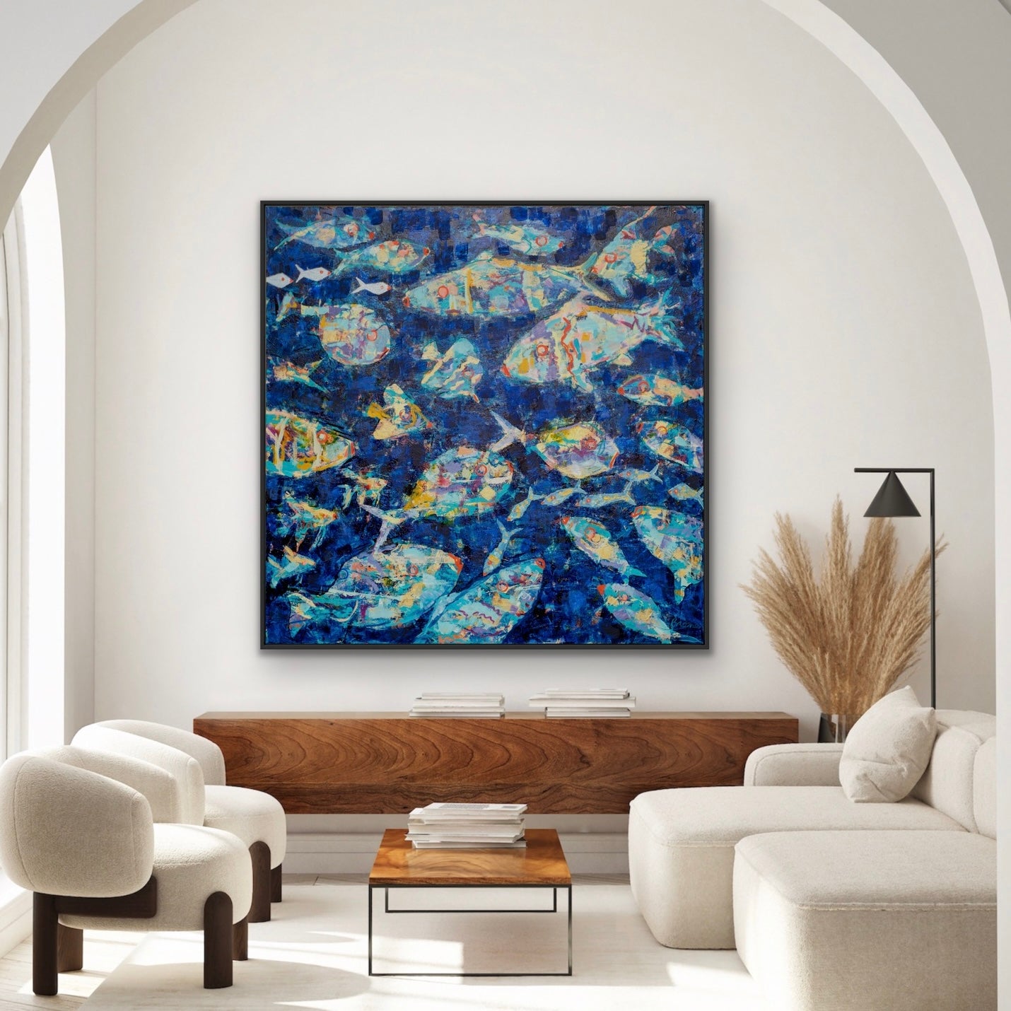 Modern living room with a coastal abstract fish painting on the wall