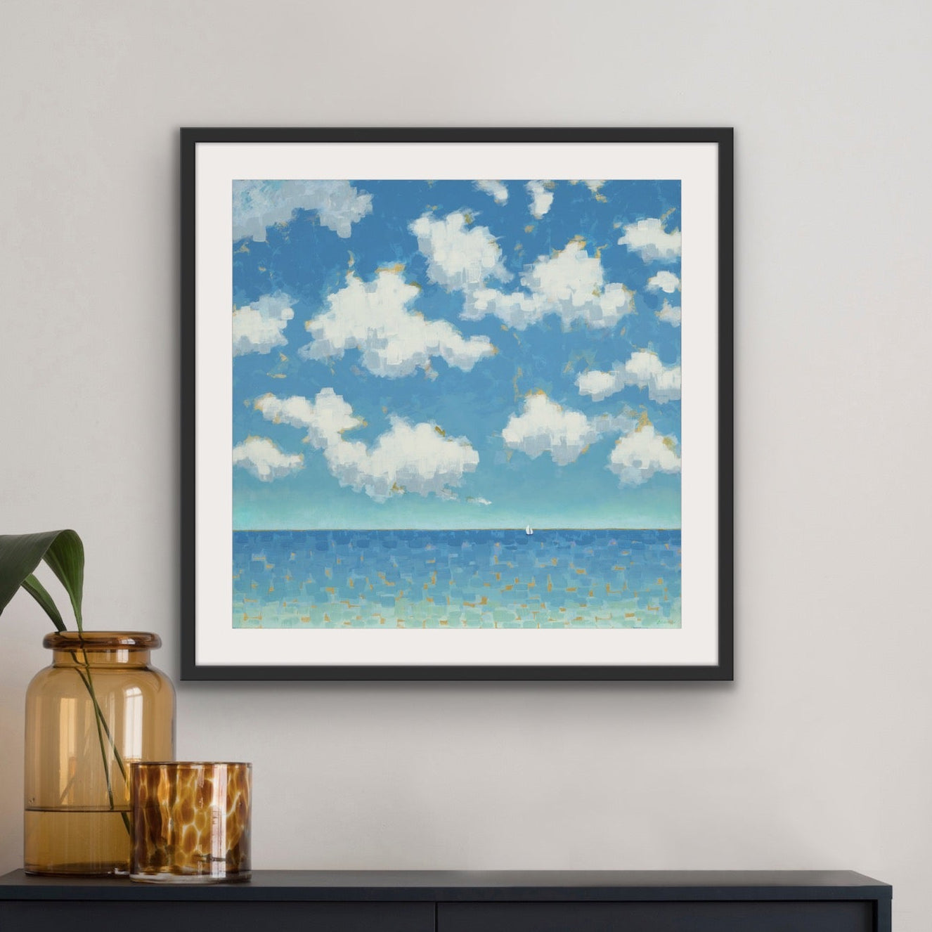 A tranquil ocean horizon and drifting sailboat beneath luminous clouds,  Far and Free by Martha Brane, symbol of peace and freedom