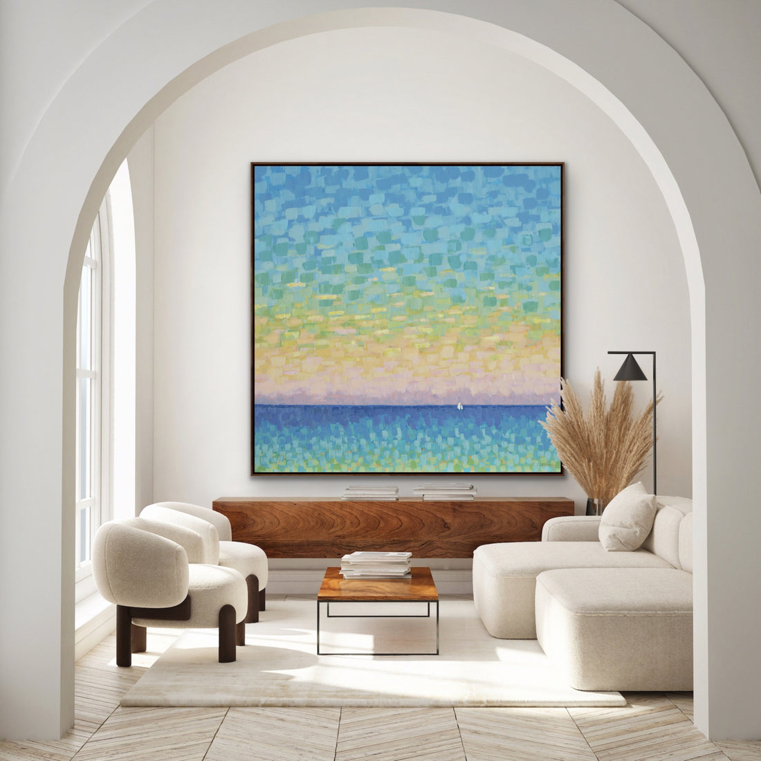 Modern living room with a colorful abstract sunset seascape painting on the wall.