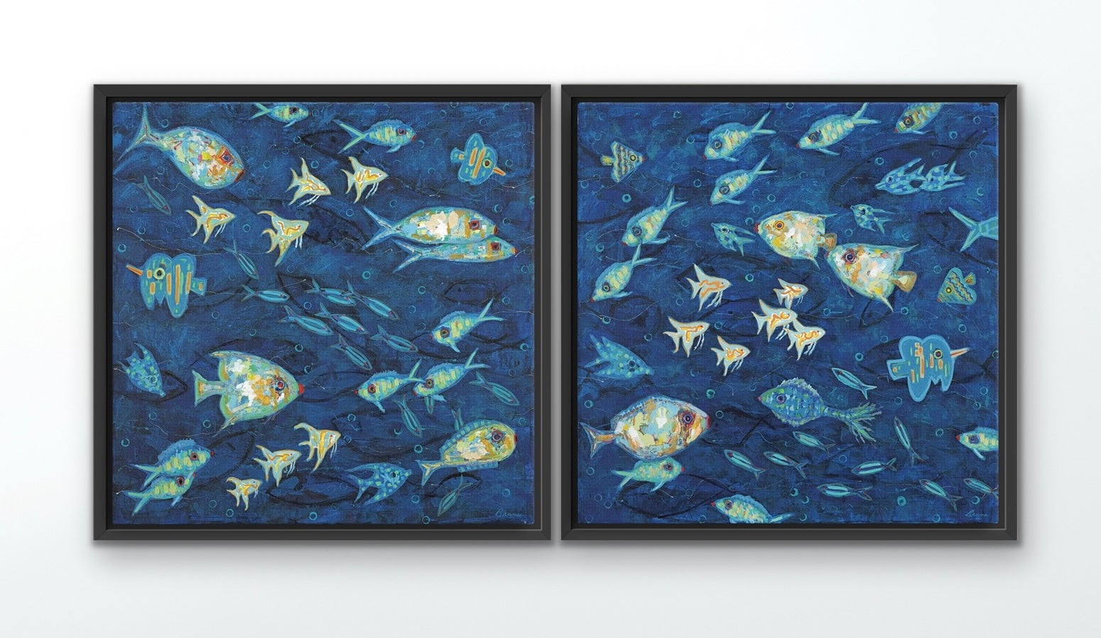 Side-by-side ocean fish canvas prints creating a bold underwater panorama