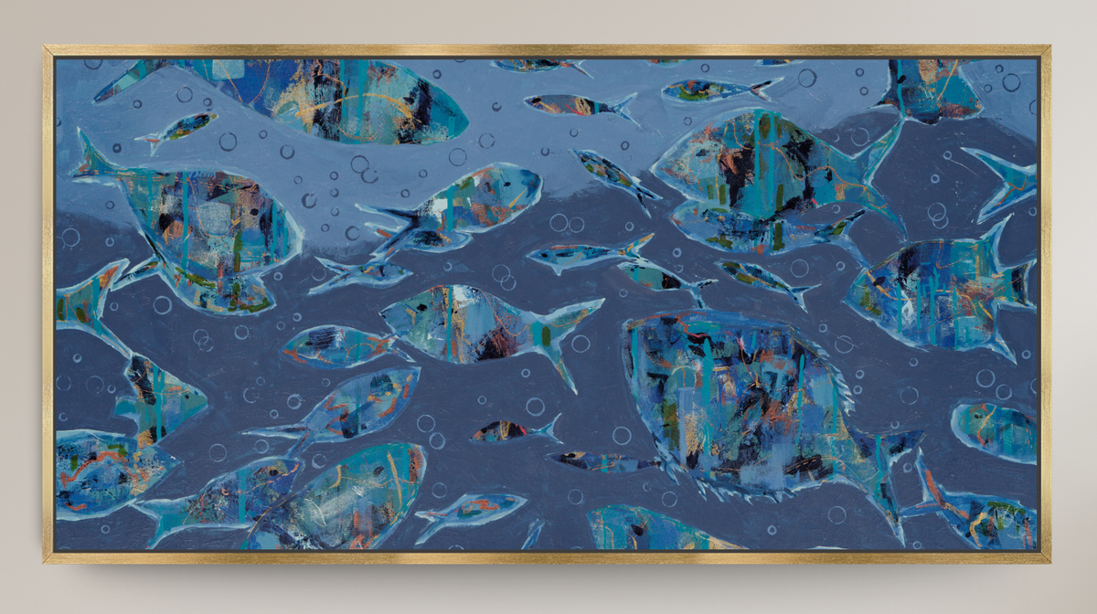 A framed abstract painting depicting a school of fish swimming underwater, rendered in shades of blue, teal, and gray with gold-toned fish highlights, enclosed in a thin gold frame.