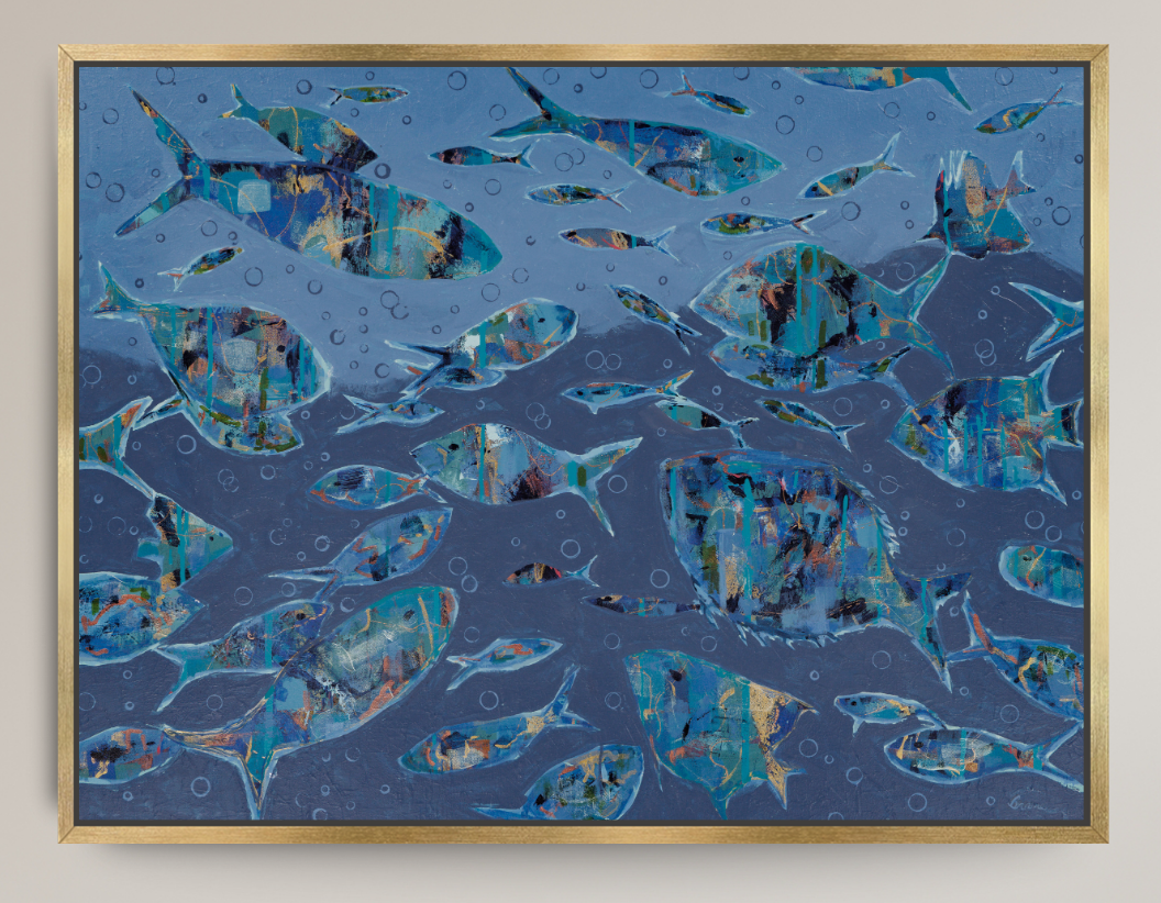 Framed square wall art featuring an underwater-style scene with many blue fish swimming over a blue ocean background, with a thin gold frame visible around the artwork.