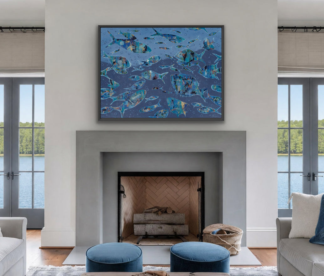 abstract fish arwork on wall above fireplace with a lake view