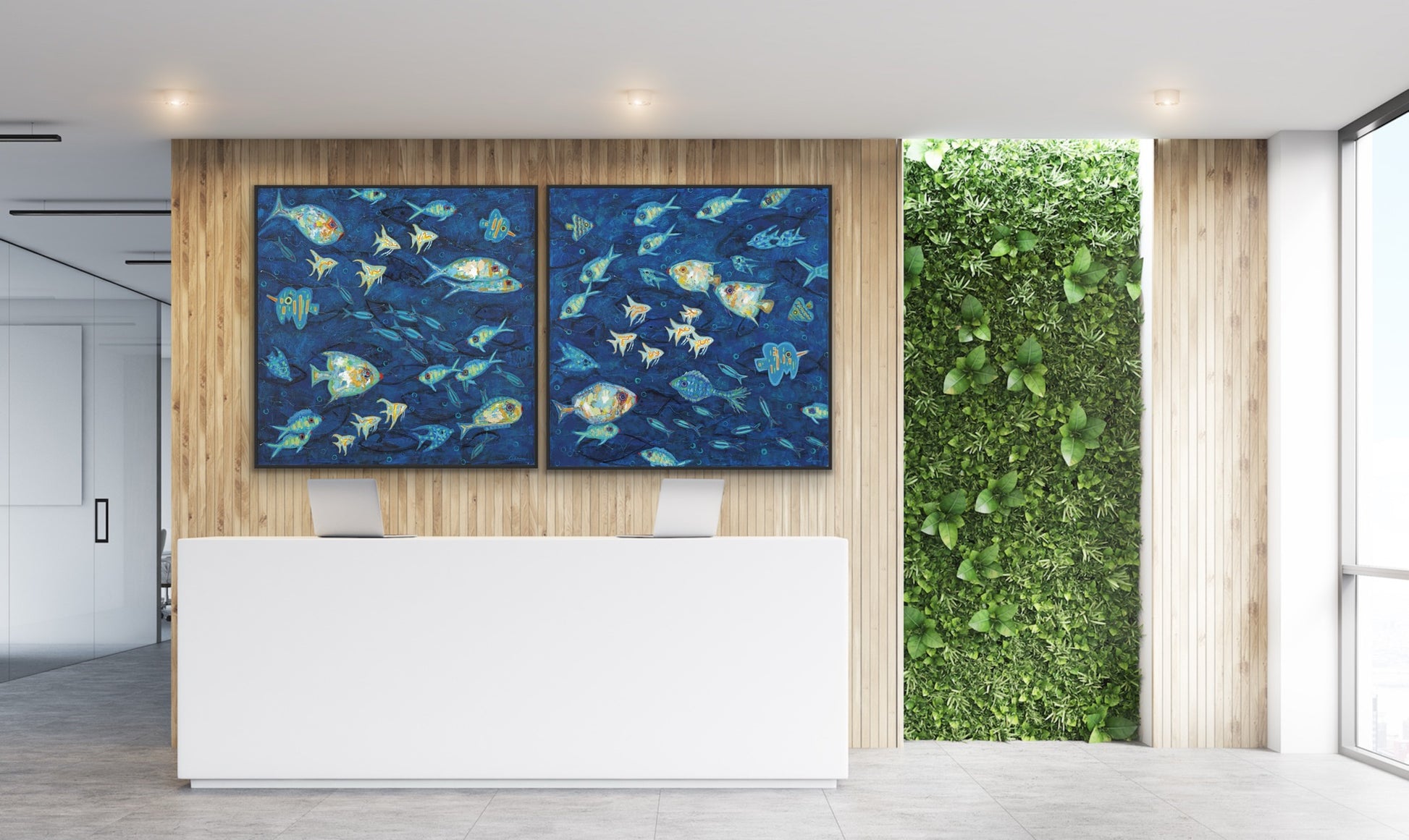 Two-panel marine artwork featuring diverse colorful fish in motion on a wall in an office setting with a green plant.