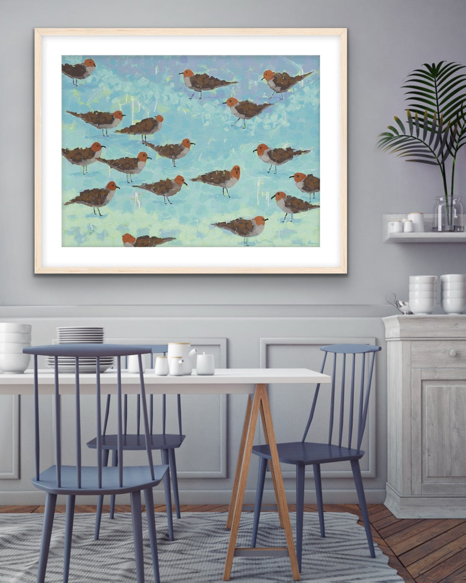 Seaside scene of seagulls on the beach fine art print in a dining room setting.