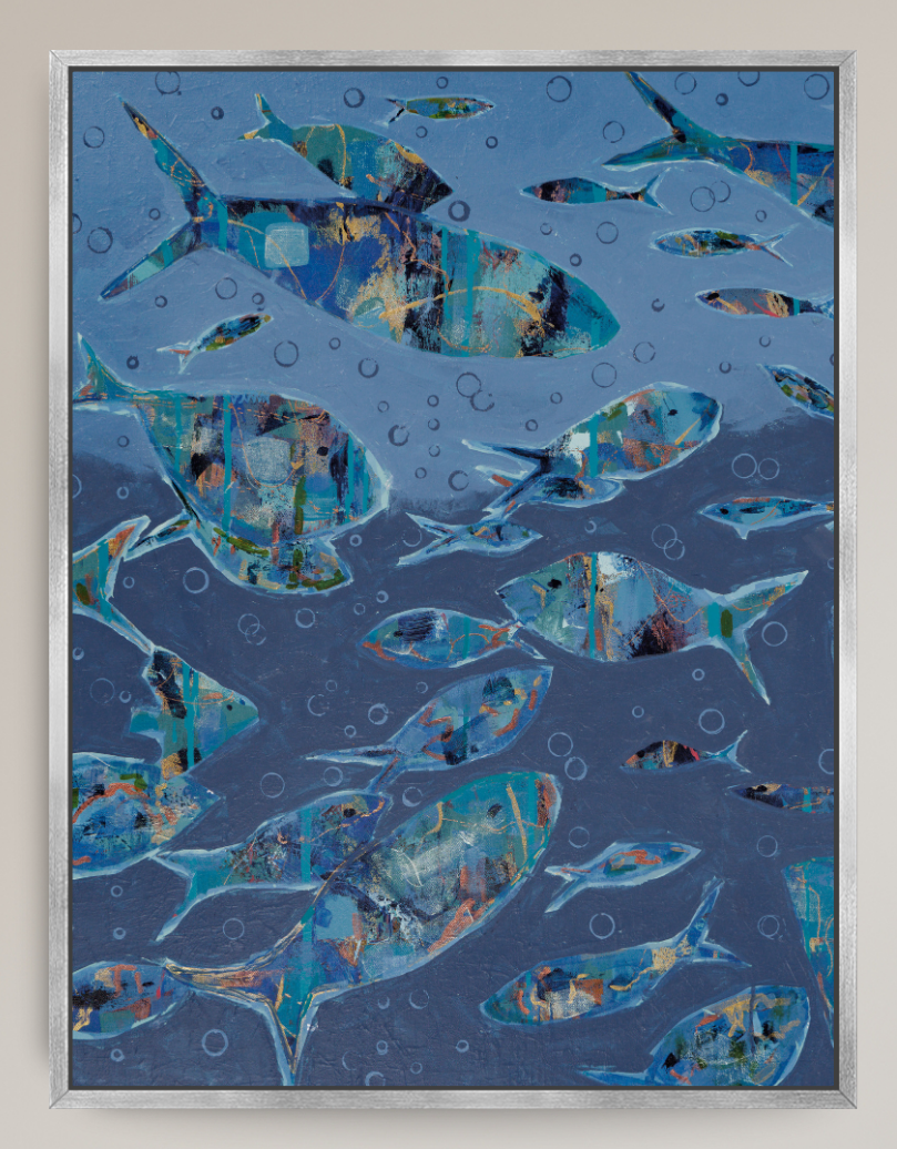 A framed abstract art print depicting a school of fish swimming underwater, rendered in shades of blue, teal, and gold with textured brushstrokes and bubble details, set in a thin silver frame.