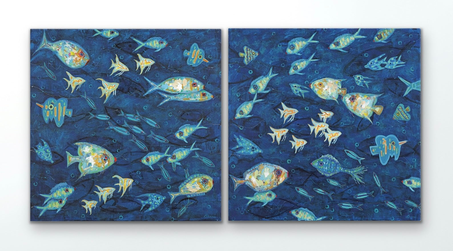 Side-by-side ocean fish canvas prints creating a bold underwater panorama
