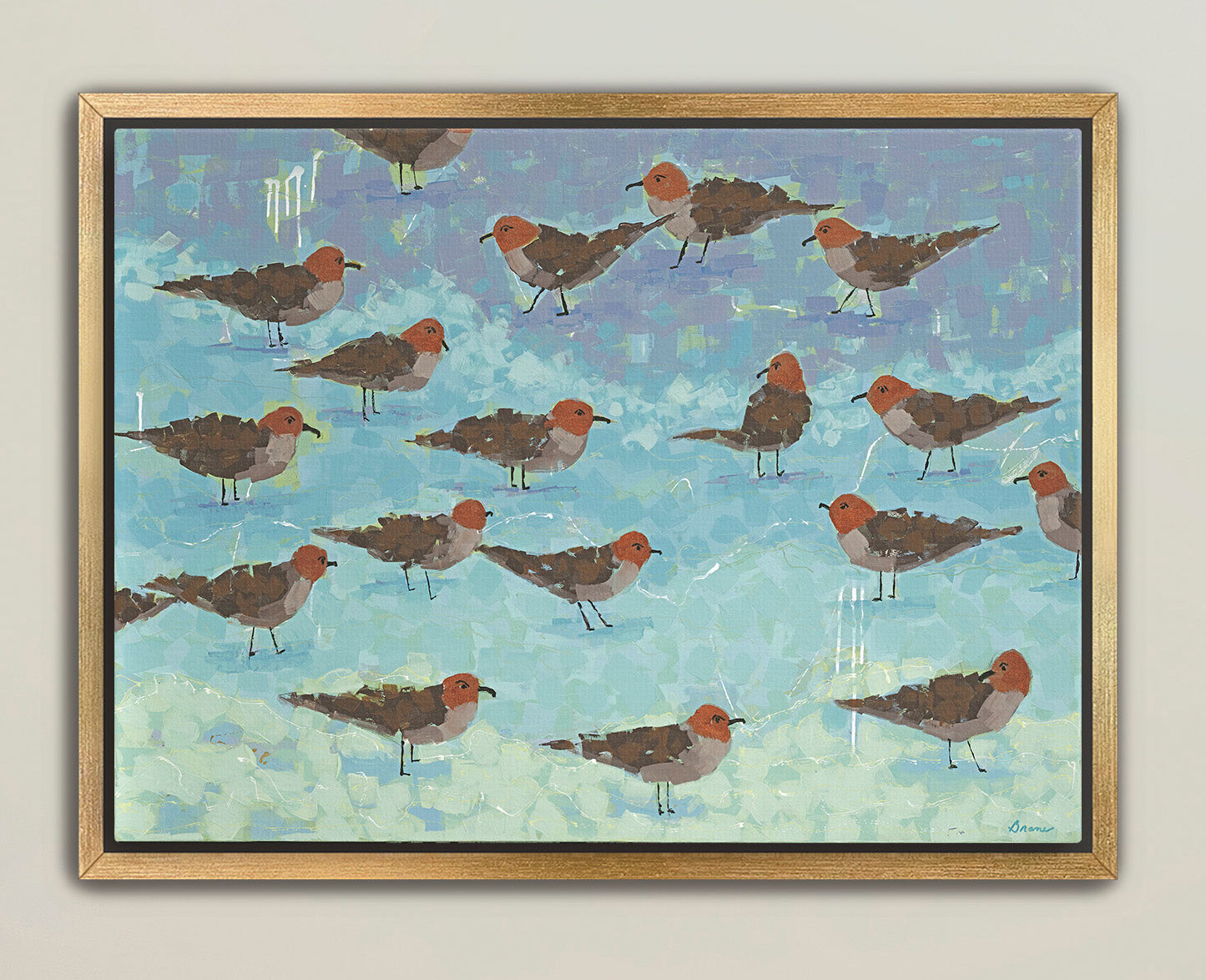 Framed coastal bird artwork featuring sandpipers on aqua shoreline”
