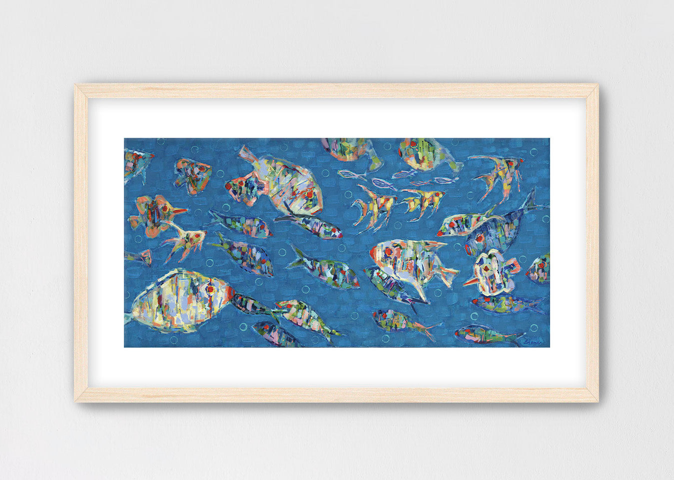 Framed abstract ocean themed artwork with colorful fish illustrations on a blue background