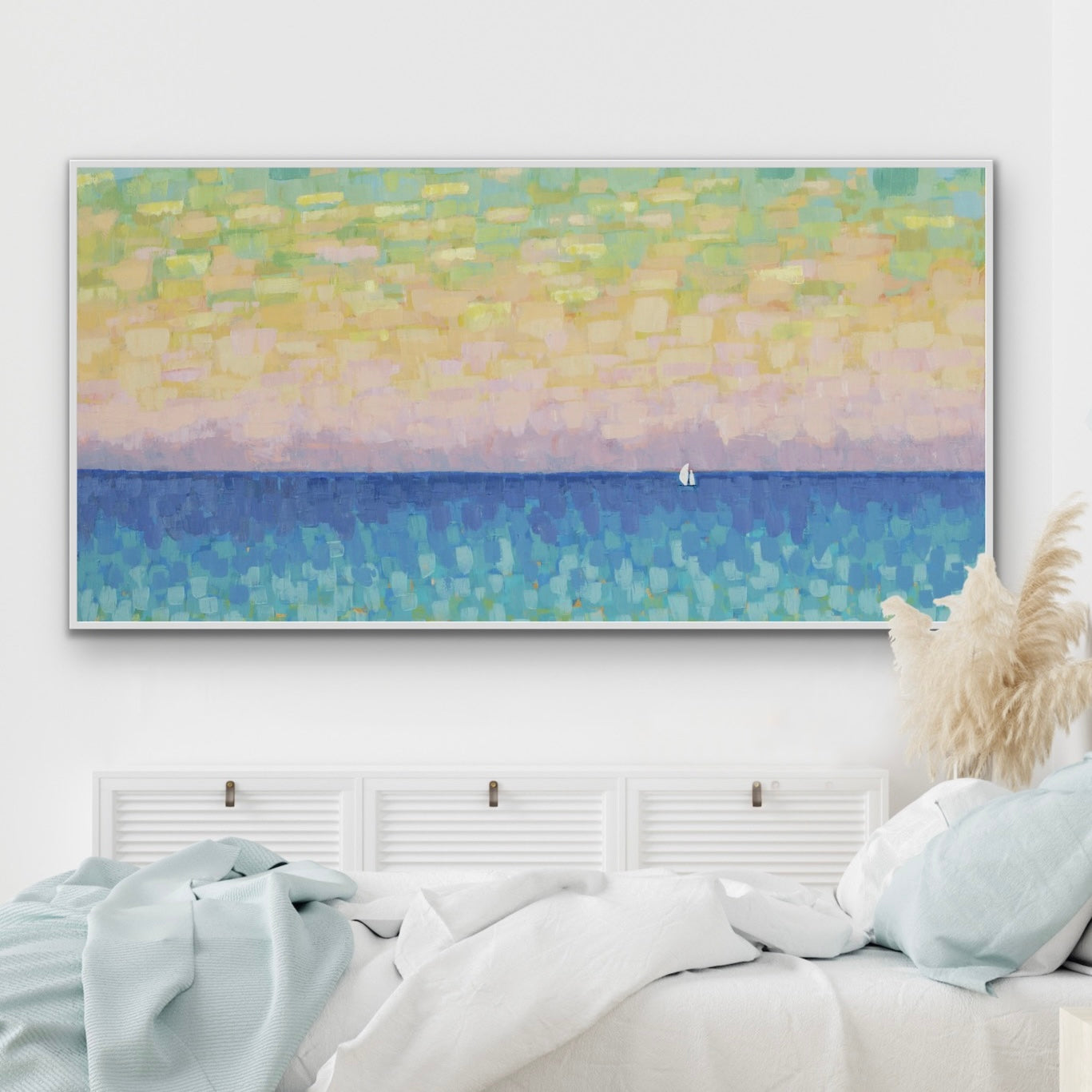 Abstract seascape with sailboat painting on a wall above a bed with light blue bedding