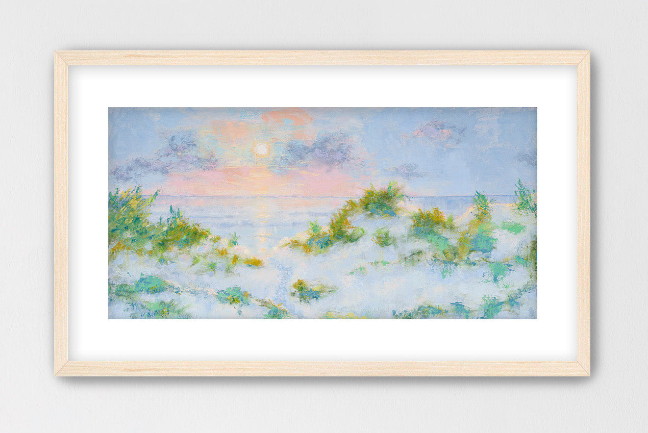 Panoramic pastel sunrise seascape with dune grasses