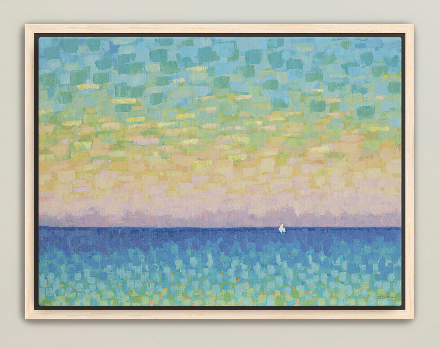 Coastal sunset wall art in soft pastel colors above natural décor