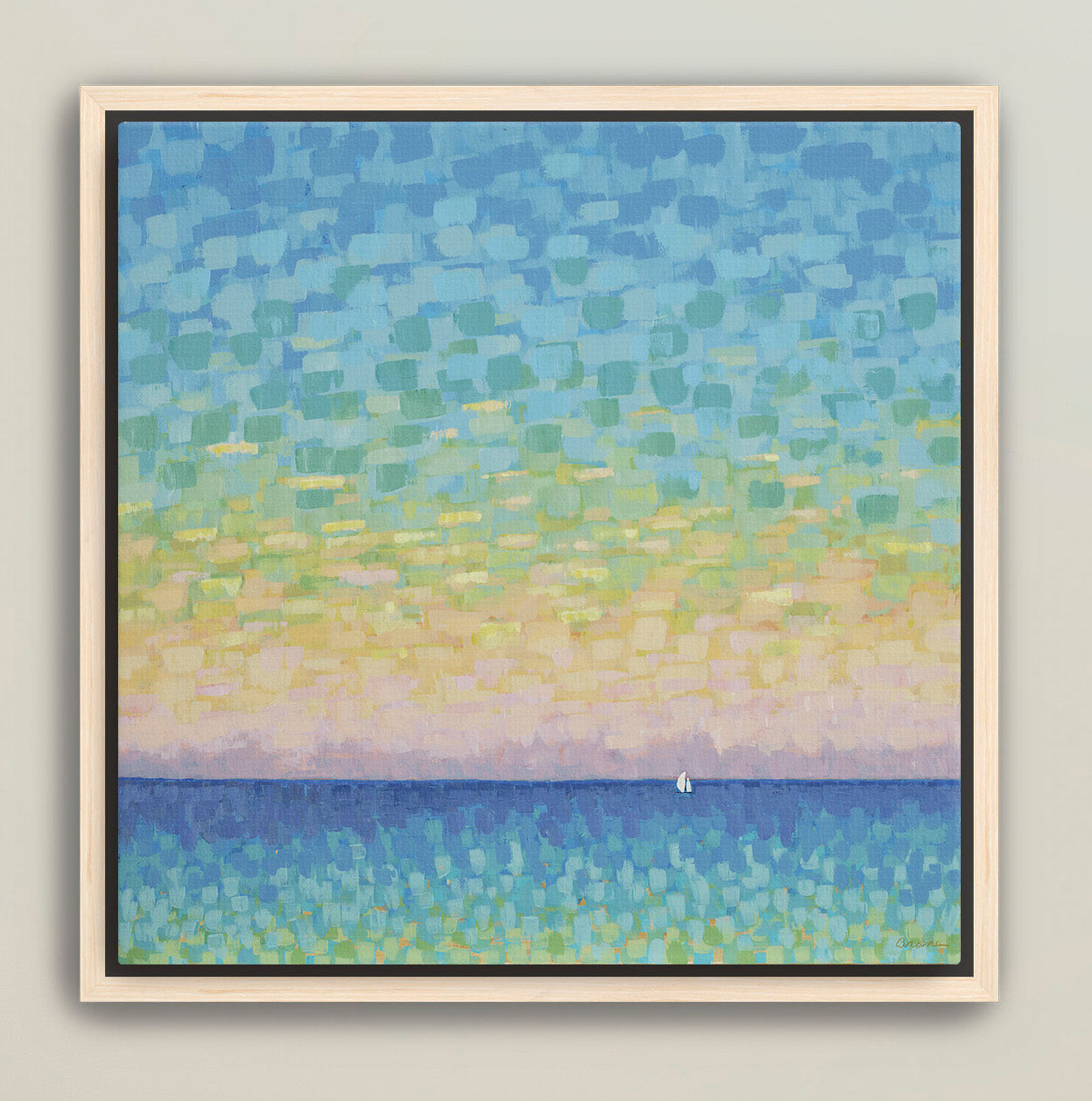 Framed ocean horizon artwork with colorful evening sky and sailboat