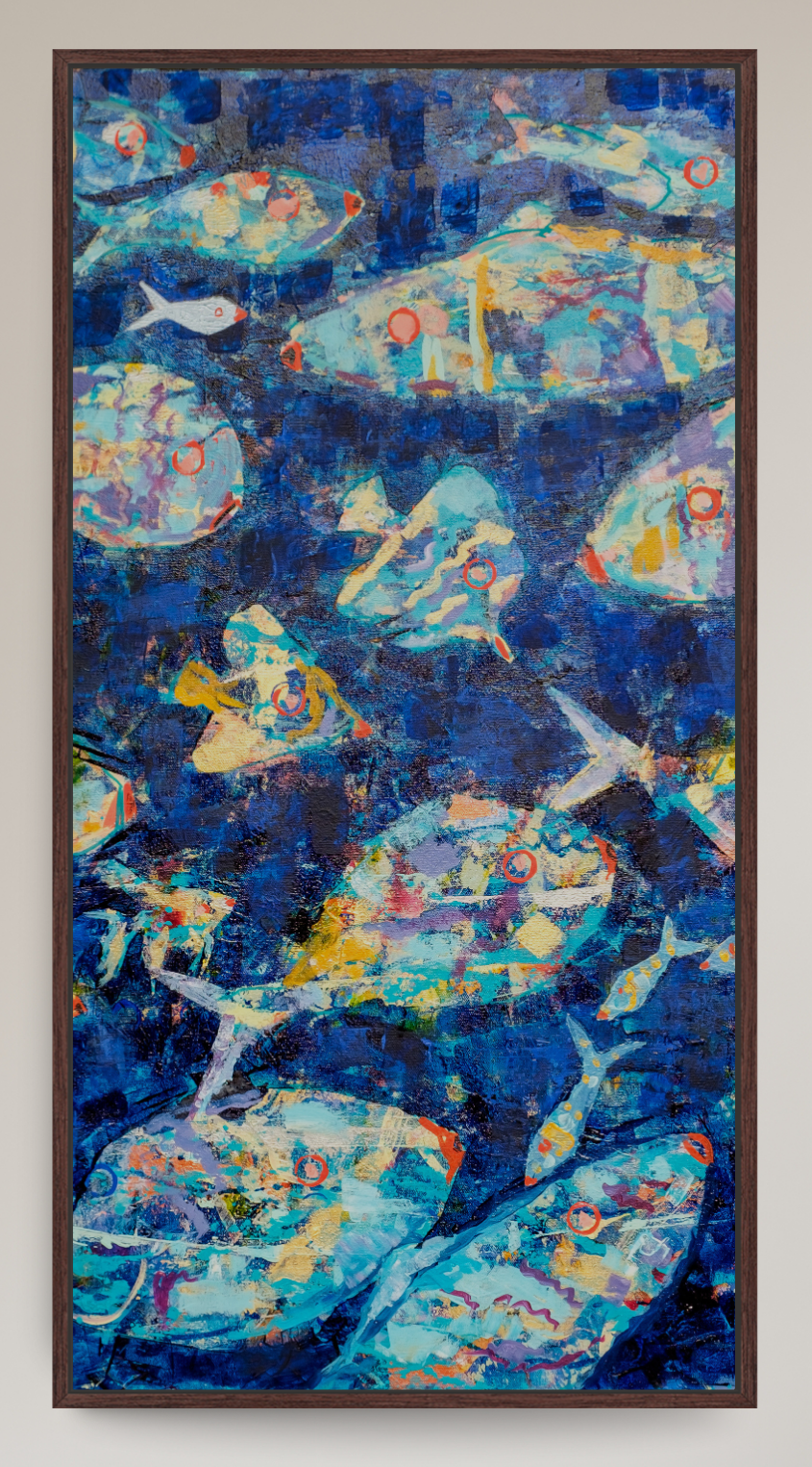 A framed abstract painting of fish swimming in deep blue water, displayed on a white wall in a modern living room setting next to a gray armchair and a potted plant.