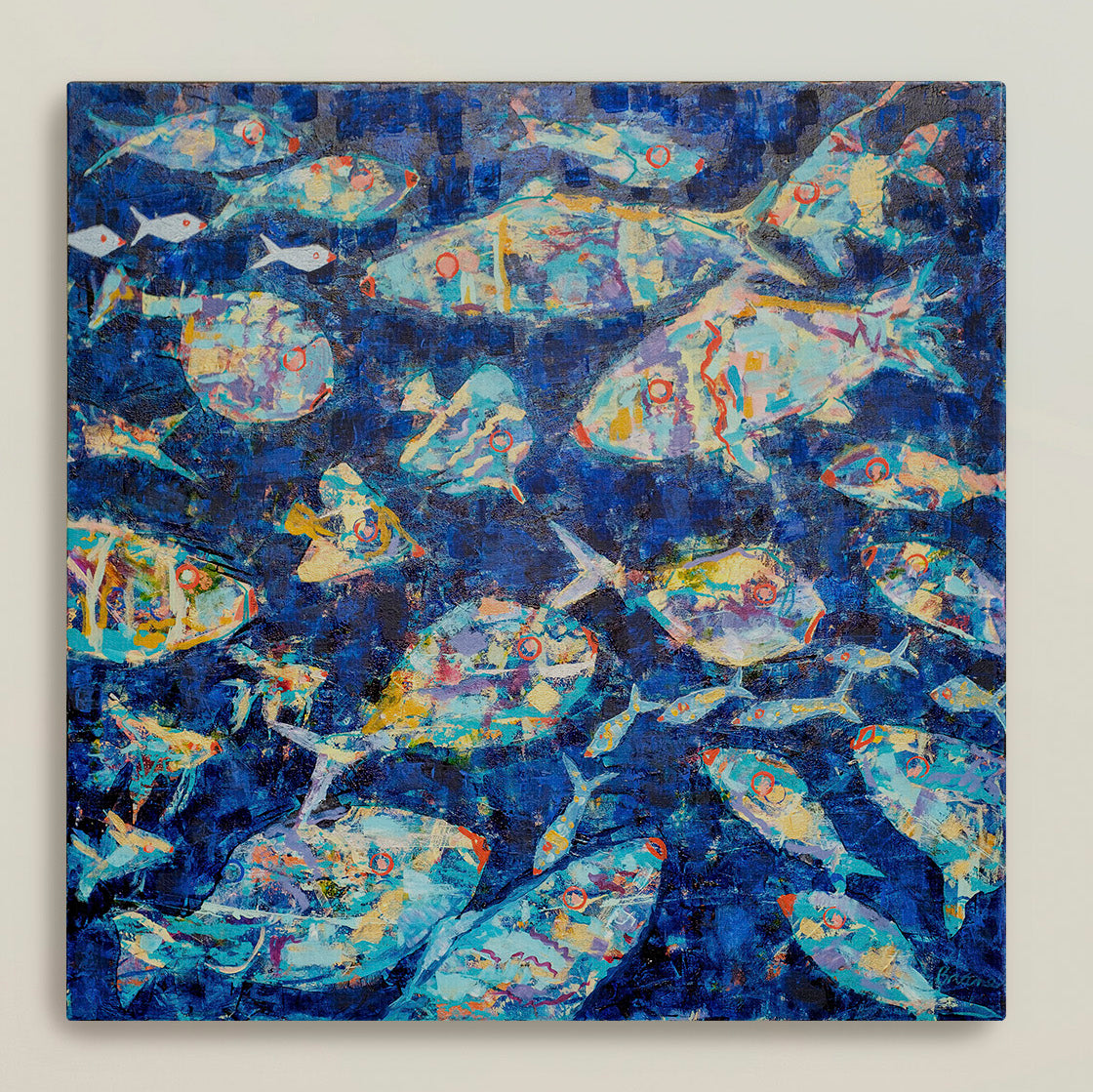 Framed underwater artwork featuring vibrant fish in deep blue sea